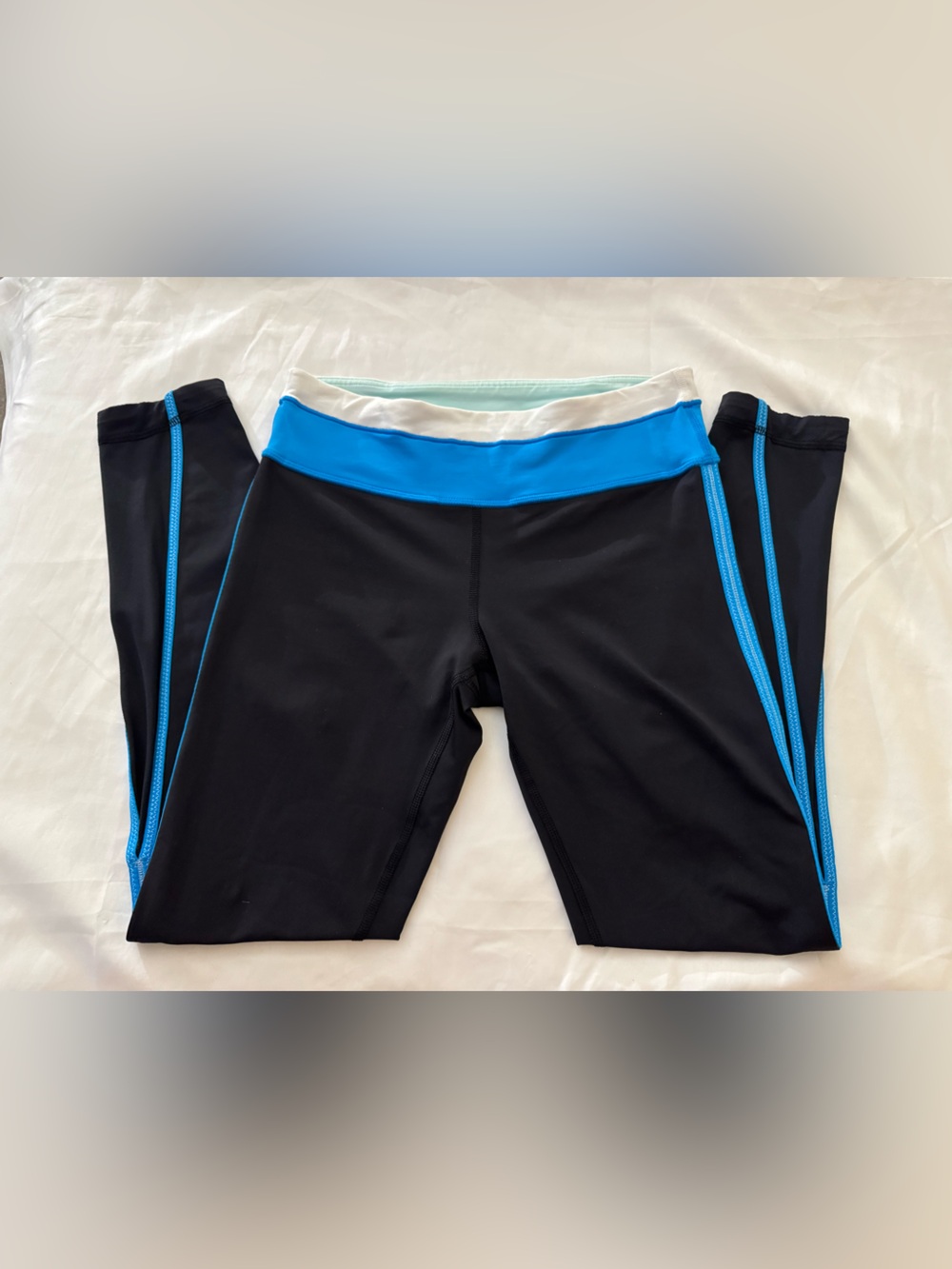 lululemon athletica Black Leggings with Bright Blue Waistband and Trim